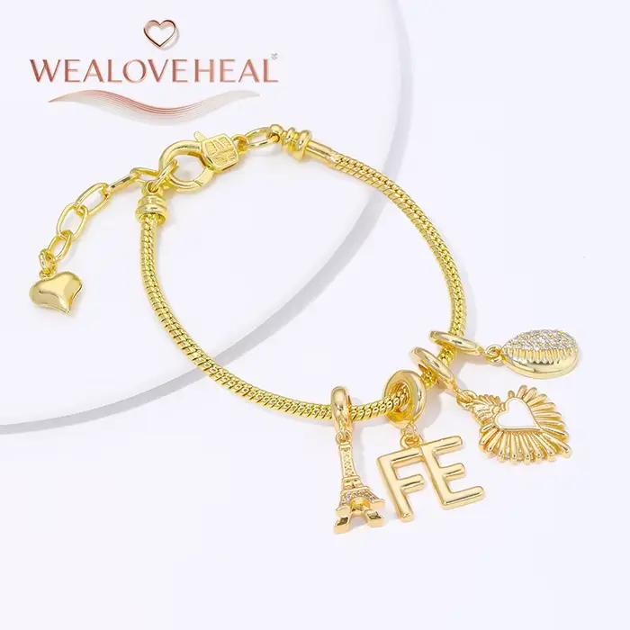 Perles pour bracelet en laiton plaqué or 18 carats avec motifs Lettre FE/Coquillage/Cœur/Tour Eiffel pour création de bijoux DIY femmes occasions spéciales