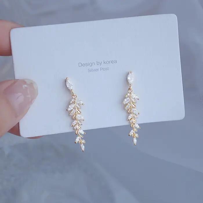 Boucles d'oreilles à breloques en feuilles d'or véritable 18 carats pour femmes