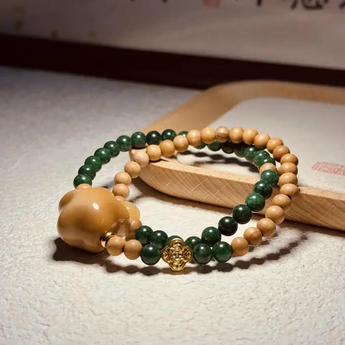 Bracelet double boucle en bois de pêcher style vintage avec perles de prière bouddhistes