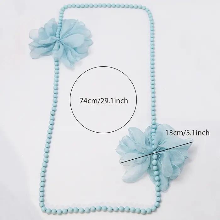 Collier long bohème élégant à grandes fleurs
