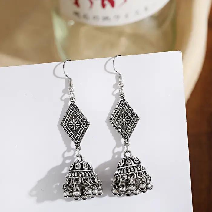 Boucles d'oreilles vintage ethniques en alliage de zinc pour femmes, élégantes et originales à porter pour des occasions spéciales et la vie quotidienne
