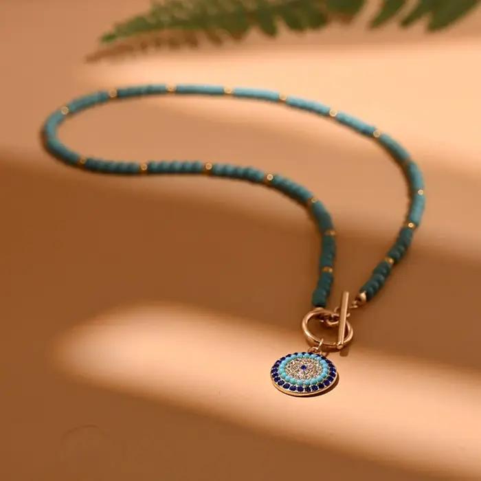 Collier pendentif oeil mignon romantique en alliage de zinc avec chaîne perles pour femmes occasions spéciales tracker d'humeur