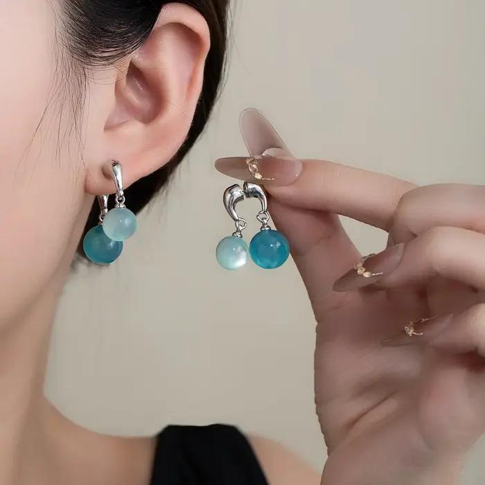 Boucles d'oreilles élégantes d'été