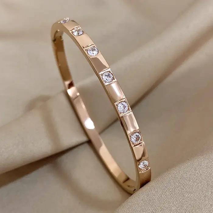 Bracelet AENSOA en acier inoxydable avec placage or et strass pour femmes élégant tracker d'humeur pour occasions spéciales et tous les jours