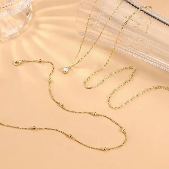 Collier en or à triple couche pour femmes en acier inoxydable forme de goutte d'eau avec zircone cubique pour superposition et belles occasions