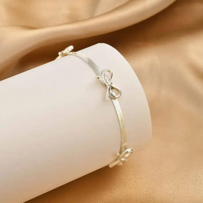 Bracelet Nœud Papillon Argenté avec Chaîne Serpent et Ruban