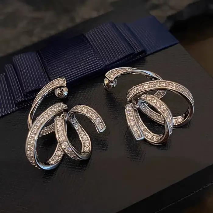 Boucles d'oreilles en forme de ruban pour femmes, bijoux de luxe en argent Sterling 925 et zircone brillant pour fête de cérémonie de fiançailles