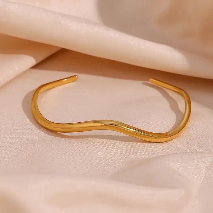 E.B.belle élégant irrégulier en forme de vague courbe ouverture bracelets en acier inoxydable pour femmes