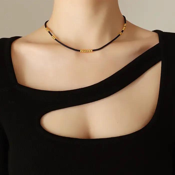 Collier en corde de tissu noir avec perles en acier inoxydable