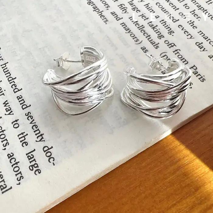 Boucles d'oreilles lignes Interware couleur argent pour femmes