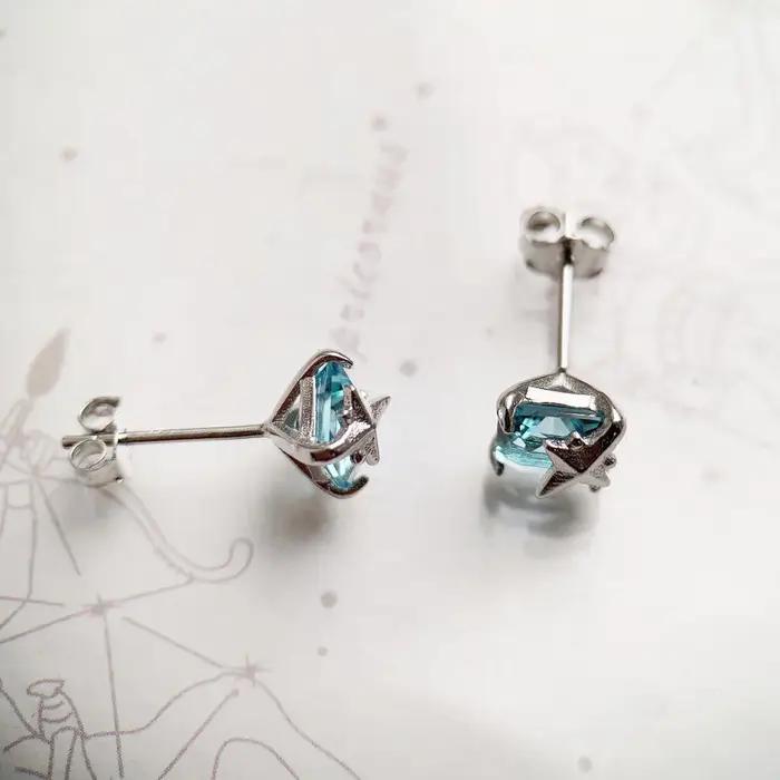 Clous d'oreilles en pierre bleue aigue-marine avec étoile