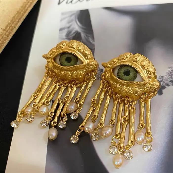 Boucles d'oreilles avec pompon en biscuits perlé pour femmes