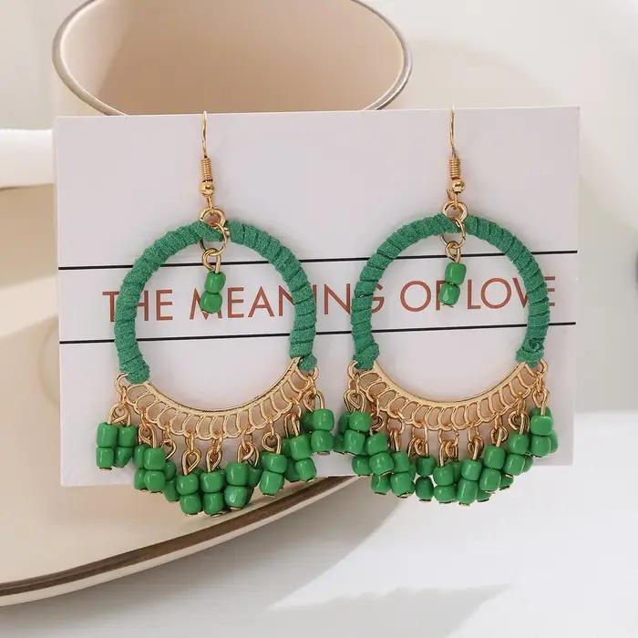 Boucles d'oreilles rondes à franges géométriques faites à la main