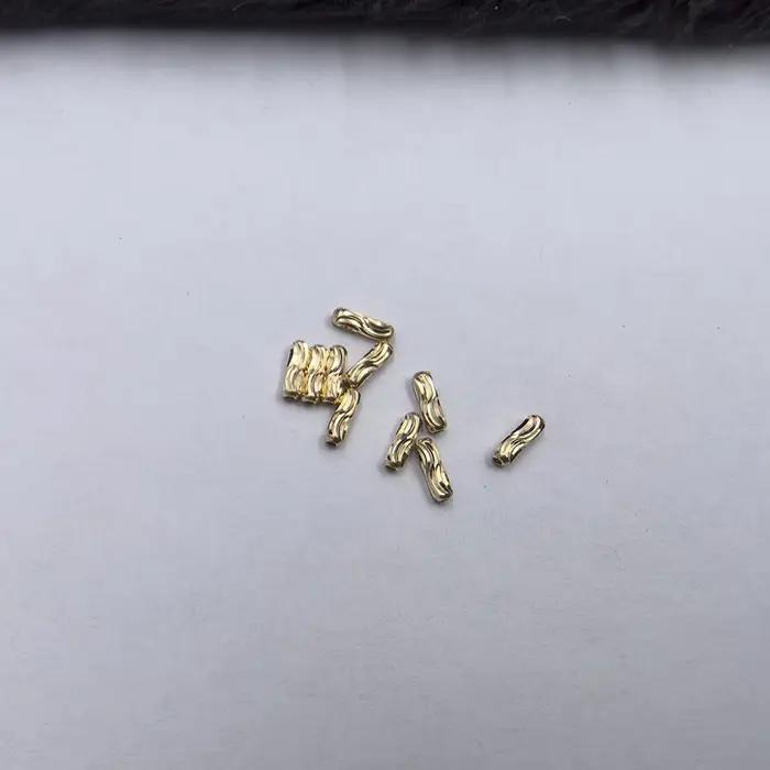 Perles cylindriques en tube d'espacement en or pur 18 carats