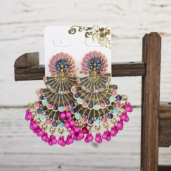 Boucles d'oreilles indiennes en paon rose pour femmes