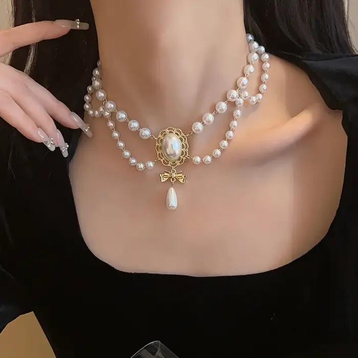Collier à pampilles en perles baroques rétro pour femmes