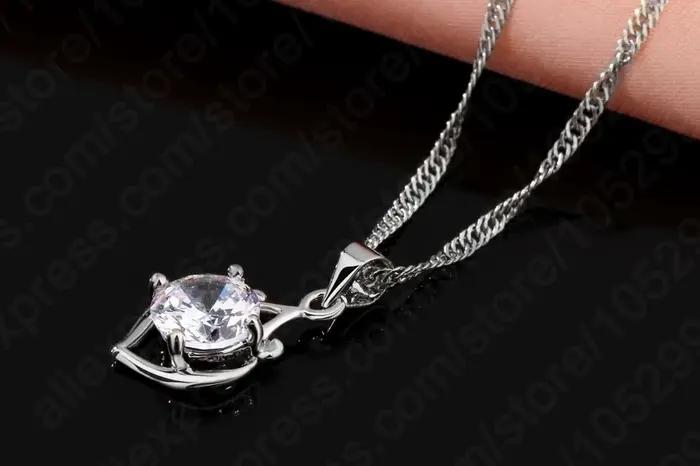 Charmant ensemble de bijoux de luxe élégant avec pendentif en strass comprenant des ensembles de collier/boucles