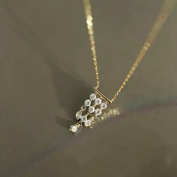 Collier en argent sterling S925 plaqué or avec pendentif en zircon et pompon pour femmes, bijou vintage à offrir pour engagement et occasions spéciales
