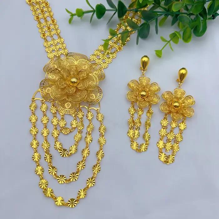 Parure de luxe éthiopienne avec collier long à fleurs et boucles d'oreilles pour mariée