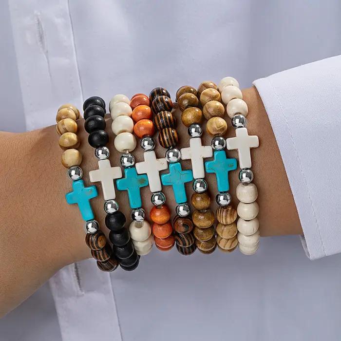 8 bracelets en perles de bois colorées à motifs
