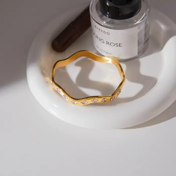 Uworld – Bracelet classique à courbes ondulées avec zircon rond blanc