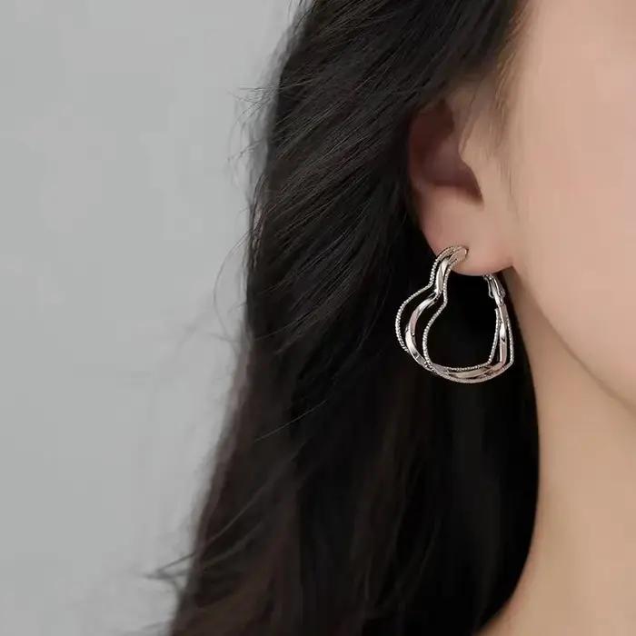 Boucles d'oreilles géométriques en argent Sterling 925 pour femmes bijoux tendance pour filles cadeau de fête lignes de grand cœur bijoux de mariage élégants et sophistiqués