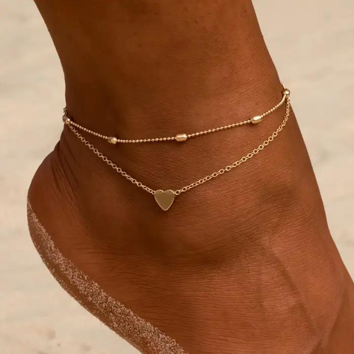 Bracelet de cheville en forme de cœur élégant pour femmes, bijou de cheville en métal or rouge à porter pour diverses occasions spéciales