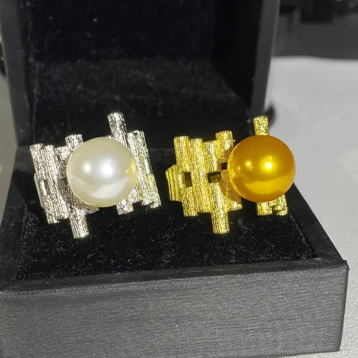 Bague de déclaration en perle métallique pour femmes, design unique, style moderne, bijou de luxe pour occasions de fête
