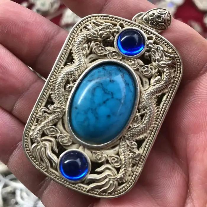 Pendentif vintage double dragon ajouré