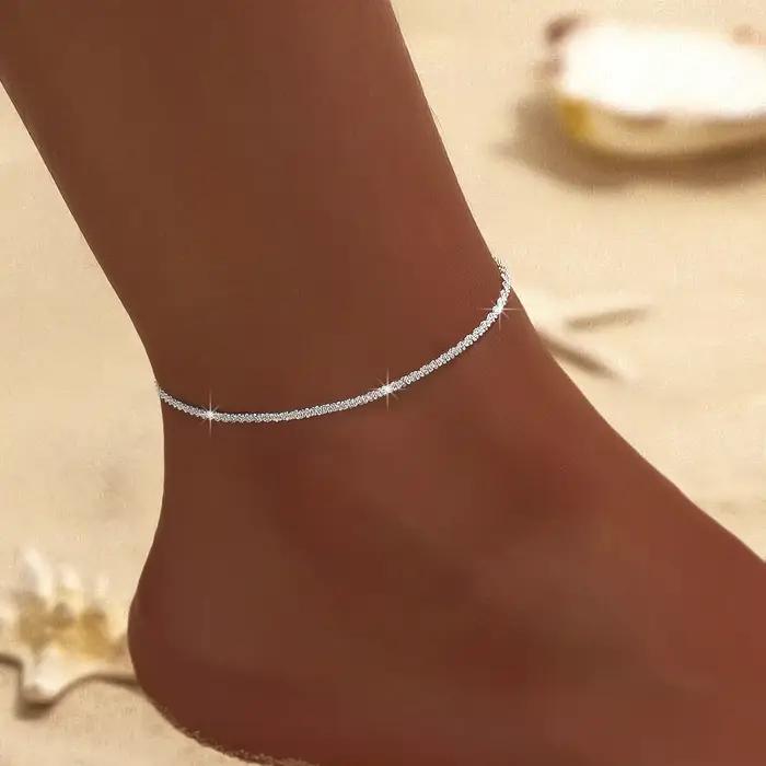 Bracelet de cheville Simple et brillant pour femmes, pendentif croix, couleur argent, bijoux élégant