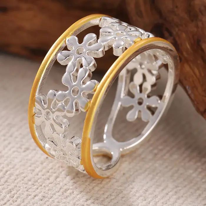 Bague ethnique pour femme sculptée à la main avec motif floral