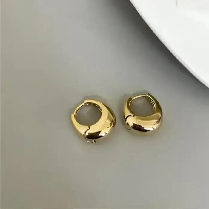 Boucles d'oreilles créoles ovales minimalistes pour femmes, géométrie en métal, document doré, cadeau de bijoux féminins, nouveau design, tendance de la mode