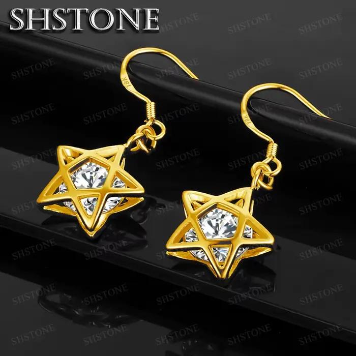 Boucles d'oreilles classiques en or 18 carats avec cristal en forme d'étoile pour femme