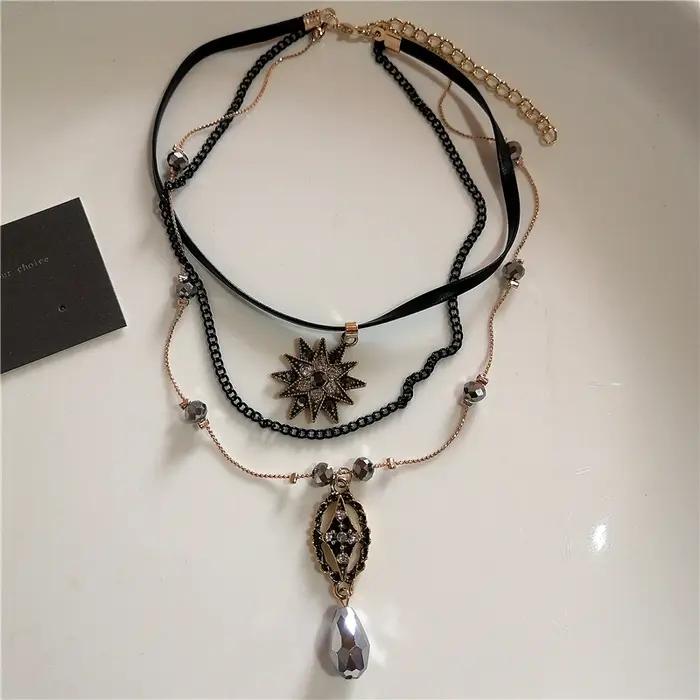 Collier Vintage en cuir avec pendentif soleil en pierre marron