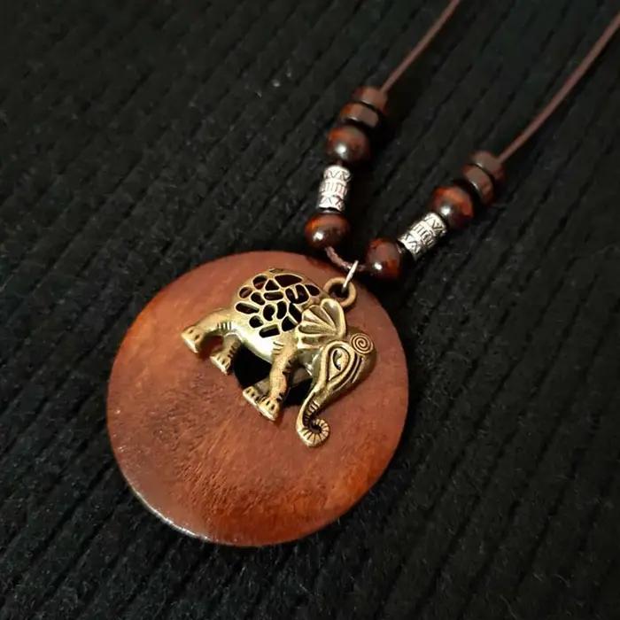 Collier en bois de style ethnique vintage avec pendentif perlé
