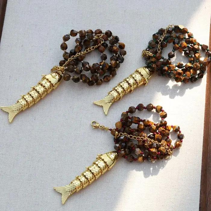 Collier avec pendentif en forme de poisson doré pour femmes