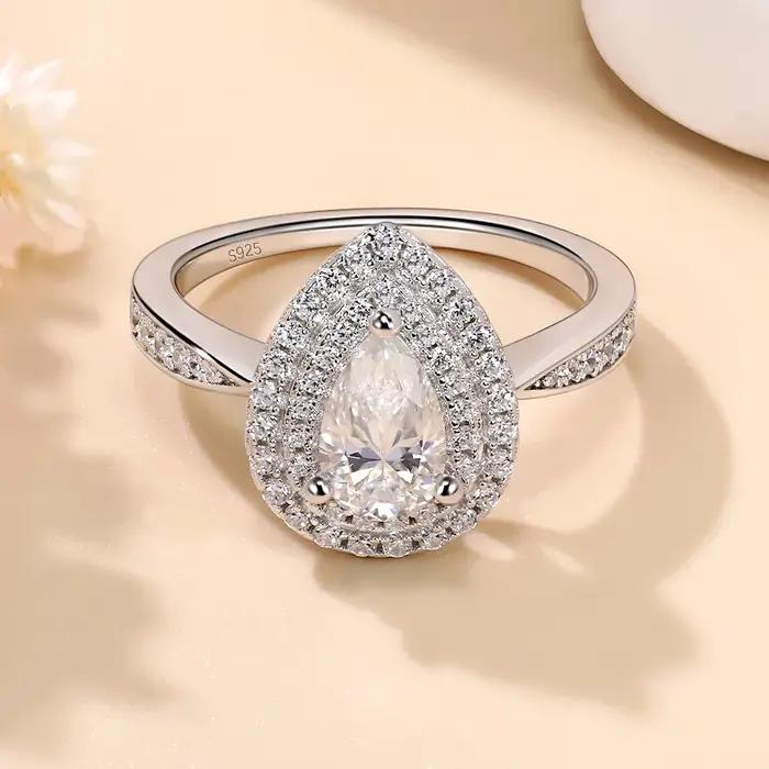 Bague de fiançailles LinkerLove en argent S925 avec moissanite taille poire 1 carat et double halo d'accentuations en