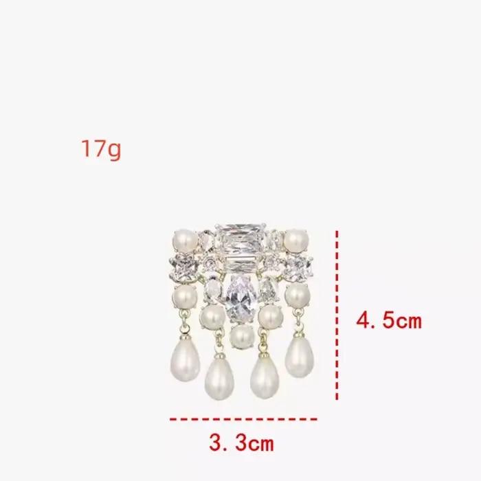 Broche incrustée de perles de strass scintillants de luxe à la mode