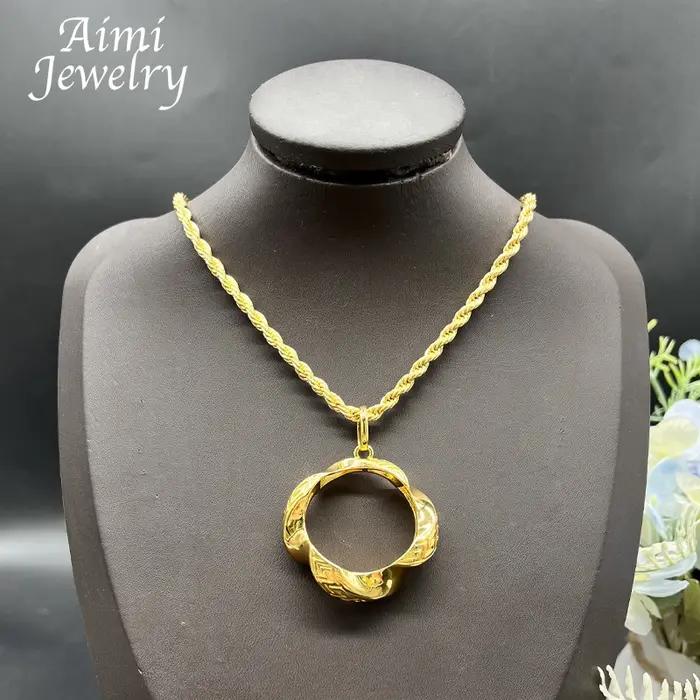 Grandes boucles d'oreilles et pendentif italiens