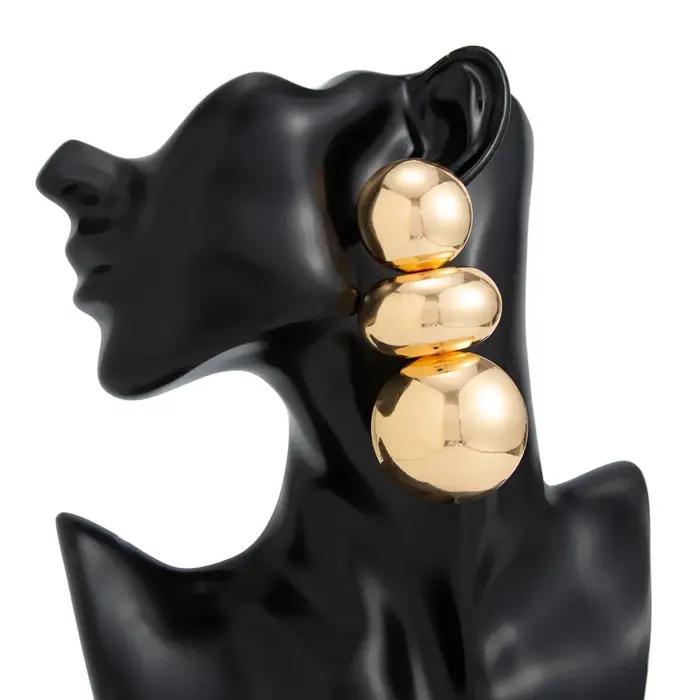 Boucles d'oreilles rondes géométriques rétro exagérées pour femmes