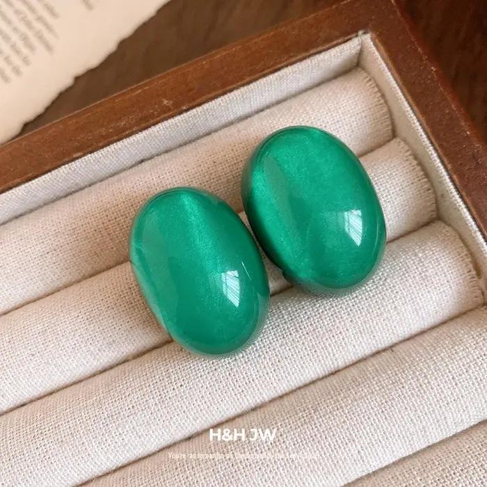 Boucles d'oreilles ovales en résine or jaune clair élégantes et sophistiquées pour femmes occasions spéciales