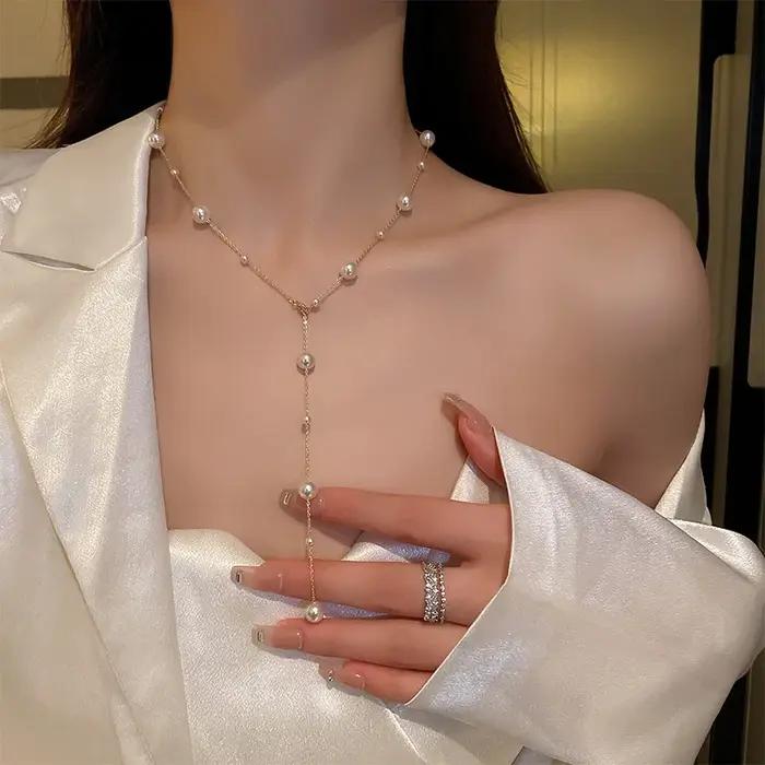 Nouveau Simple Long Imitation perles dos collier pour femmes Sexy gland perle harnais Bikini poitrine chaîne corps bijoux Mujer