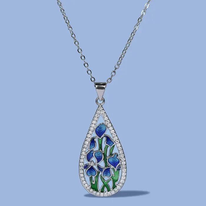 CAOSHI – collier élégant avec pendentif en émail en forme de fleur bleue, motif Unique d'éternité, a