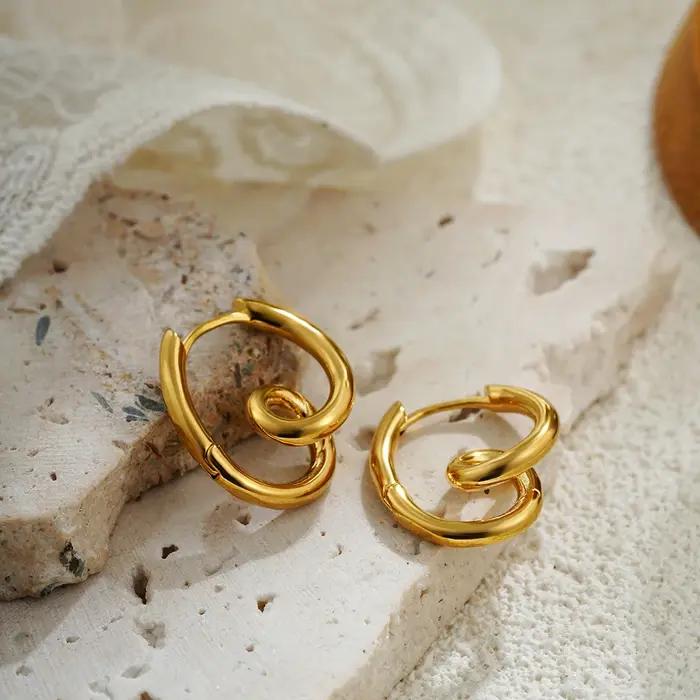 Boucles d'oreilles vortex exquises pour femmes