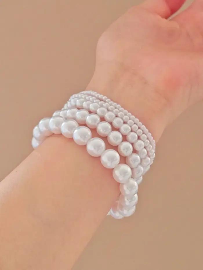Bracelets en perles d'imitation classiques avec finition plaquée platine pour femmes, bracelets à brins rétro élégants pour occasions spéciales
