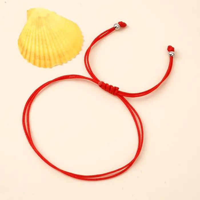 Bracelet en corde rouge et chaîne porte-bonheur de guérison faite à la main style boho minimaliste pour femmes et hommes occasion festival
