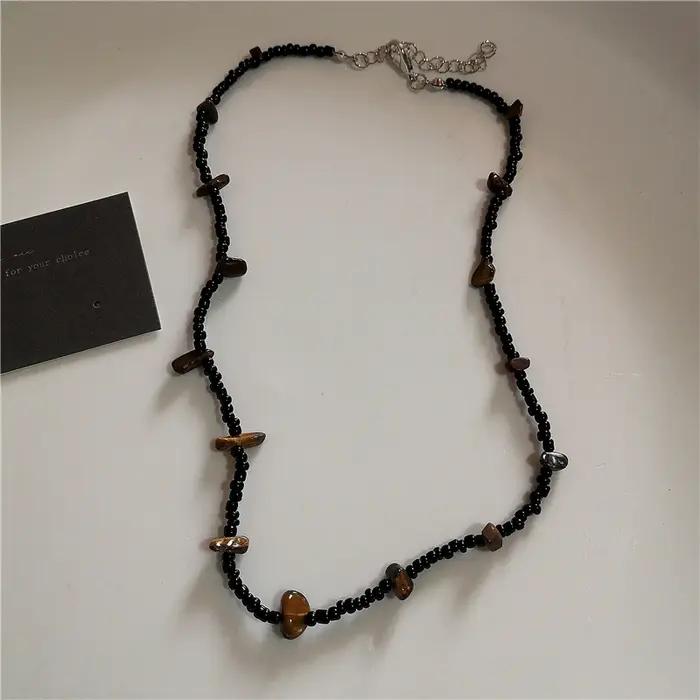Collier Vintage en cuir avec pendentif soleil en pierre marron