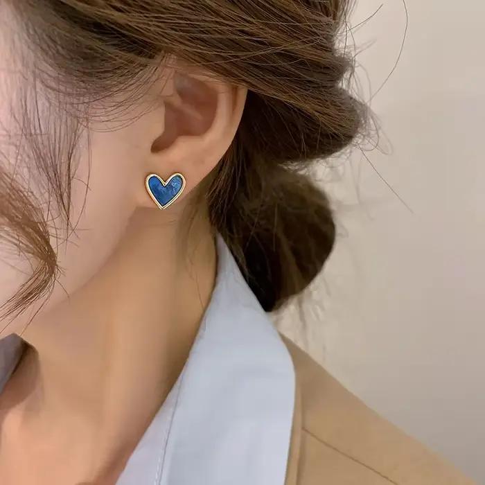 Vintage en forme de coeur bleu blanc amour boucles d'oreilles femme tempérament Niche