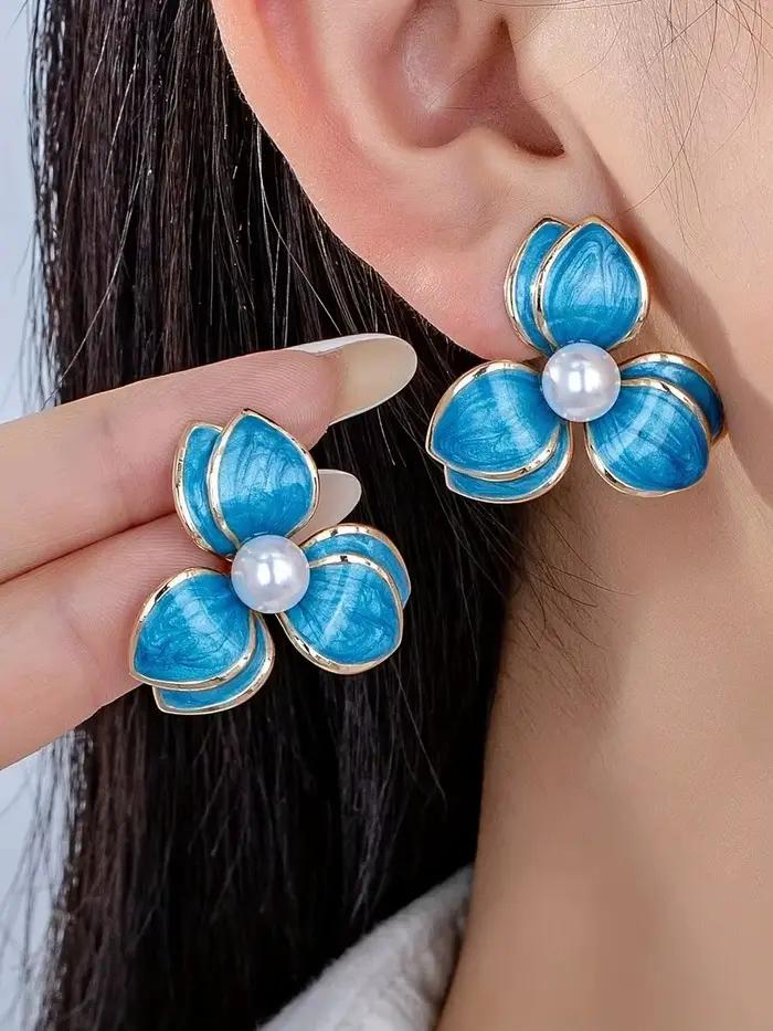 Une paire de boucles d'oreilles élégantes et décontractées de style Amazon transfrontalier avec un d