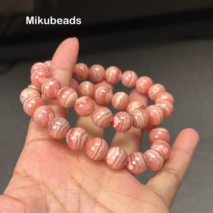 Perles rondes lisses en rhodochrosite naturelle 8-11.5mm 3A